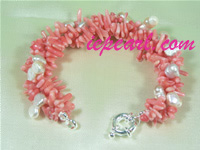 Twisted cultured pearl bracelet with red coral in wholesale