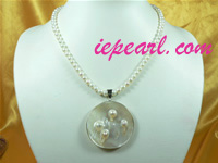 6-7mm white cultured pearl necklace with a round pendant
