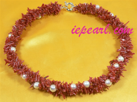 twisted side drilled pearl necklace with red coral beads