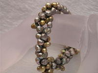 Wholesale triple rows twisted freshwater pearl bracelet