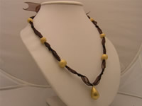 Mystery black ribbon-tie necklace with 18K GP golden beads