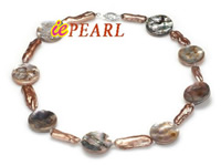 stick pearl necklace, alternating with round sea shell beads
