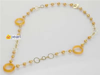 Hand wired champagne FW cultured pearl donut jade necklace