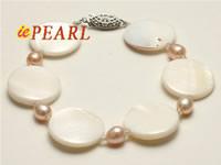 shell bracelet with 6-7mm pink rice pearl in 7.5 inches