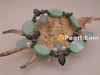 shell bracelet with eye crytal and black pearls