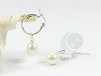 Pierced earrings dropping big rice pearl from big loop