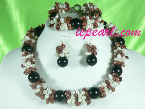 white rice shaped pearl necklace set with red stone beads